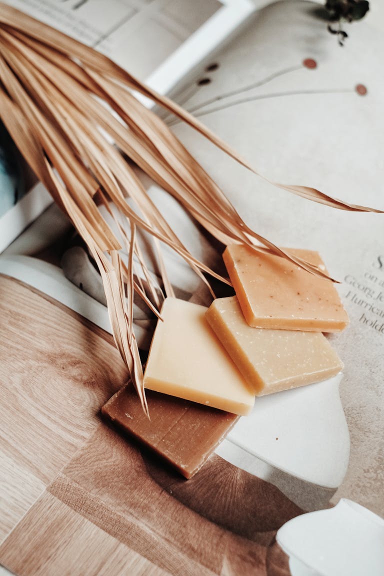 Elegant display of natural bar soaps on a magazine with eco-friendly vibes.